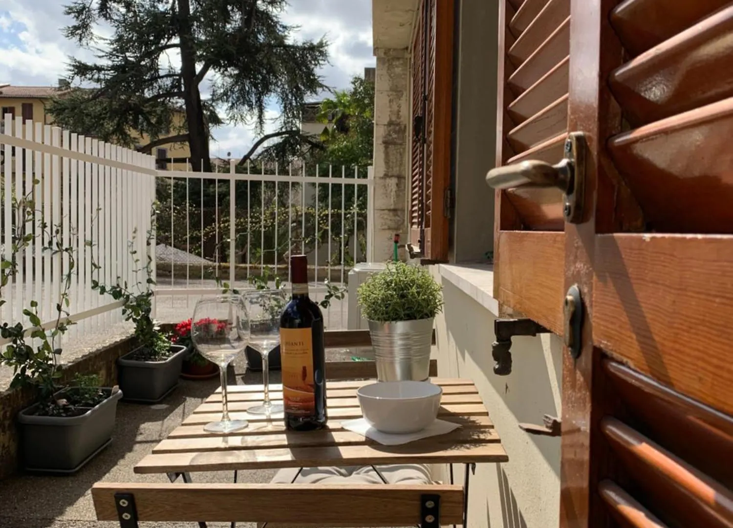 Open The Classic Wooden Shutters At A Cozy City Nest Florencia